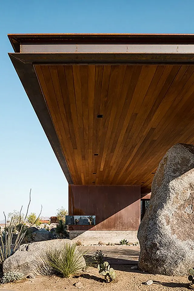 Desert guardhouse with boulder, minimal, organic, warm