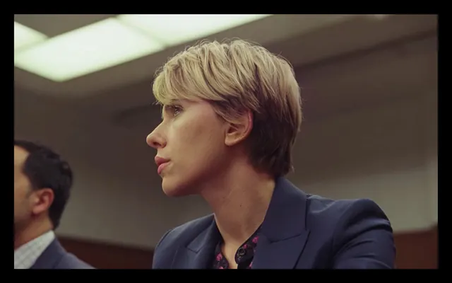 Blonde profile in navy blazer film still, photographic, editorial, dark