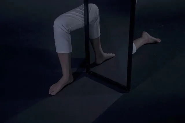 Minimalist Figure in Shadow