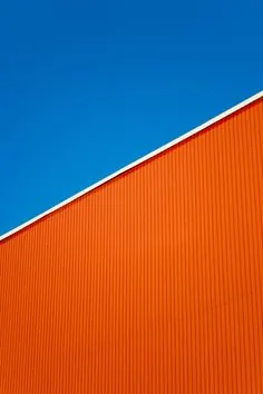 Orange Corrugated Surface and Blue Sky
