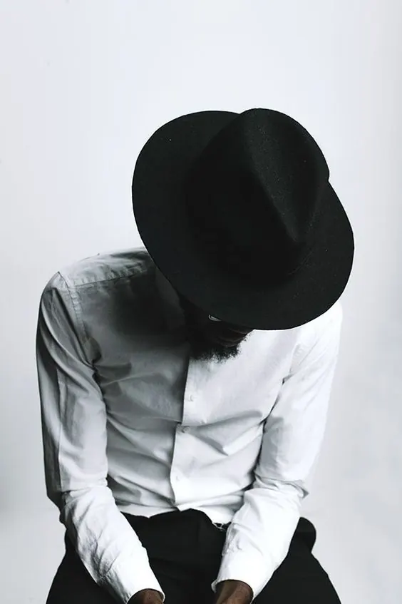Monochrome Portrait of Man in Hat