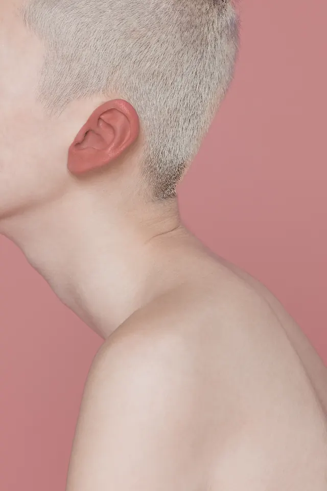 Close-up Portrait with Pink Background