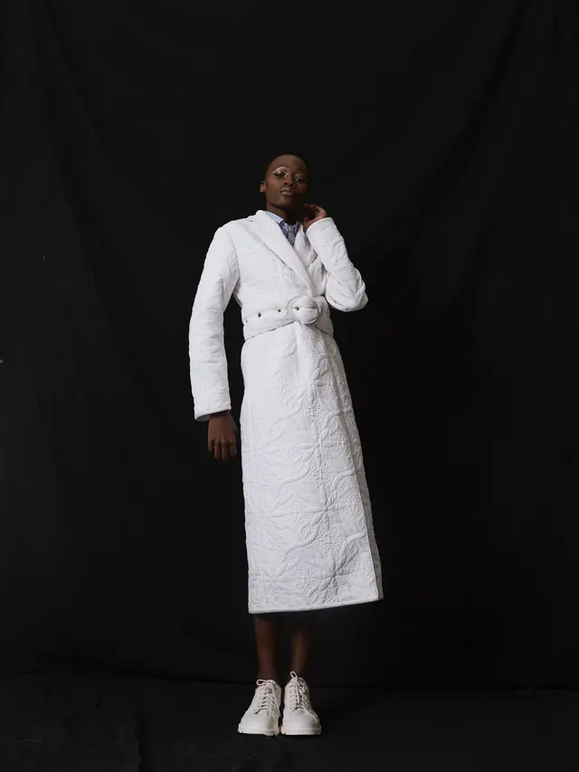 Model in White Textured Garment
