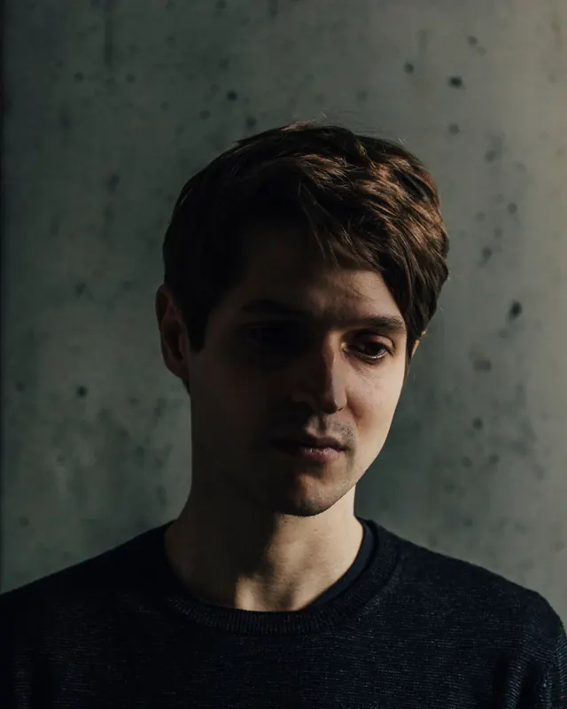 Portrait of a man in low light
