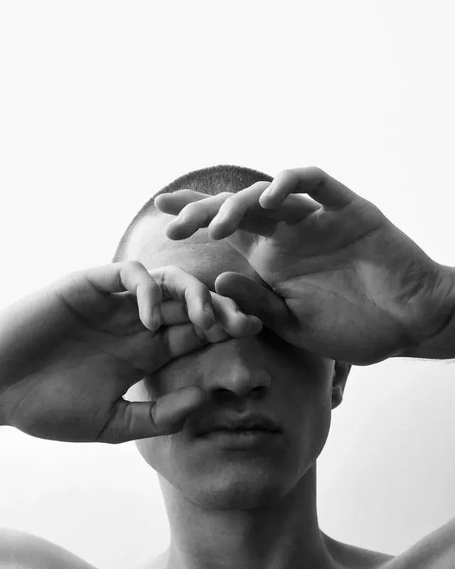 Monochrome Portrait with Hand Overlay