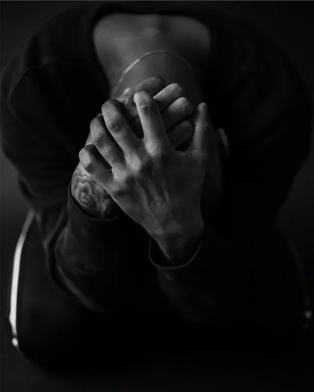 Black and white intimate male portrait with line, photographic, monochrome, dark