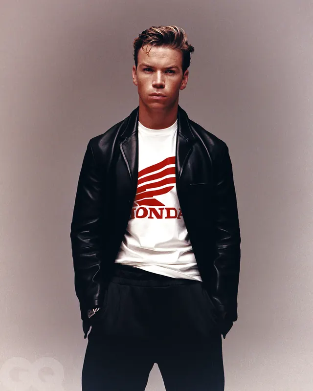 Portrait of man in leather jacket with Honda logo tee, photographic, corporate-clean, dark