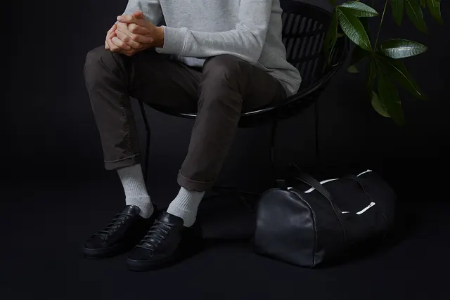 Lifestyle Portrait of Person in Lounge Chair