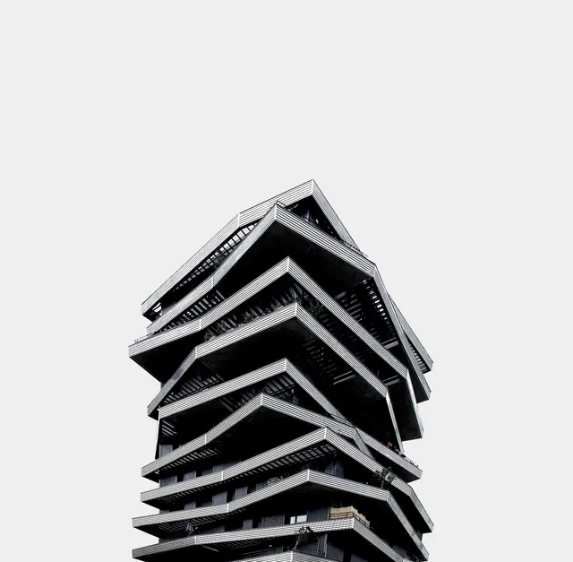 Cantilevered high-rise from below, geometric, minimalist, dark