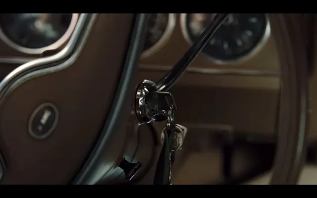 Vintage car door lock detail, photographic, technical, dark