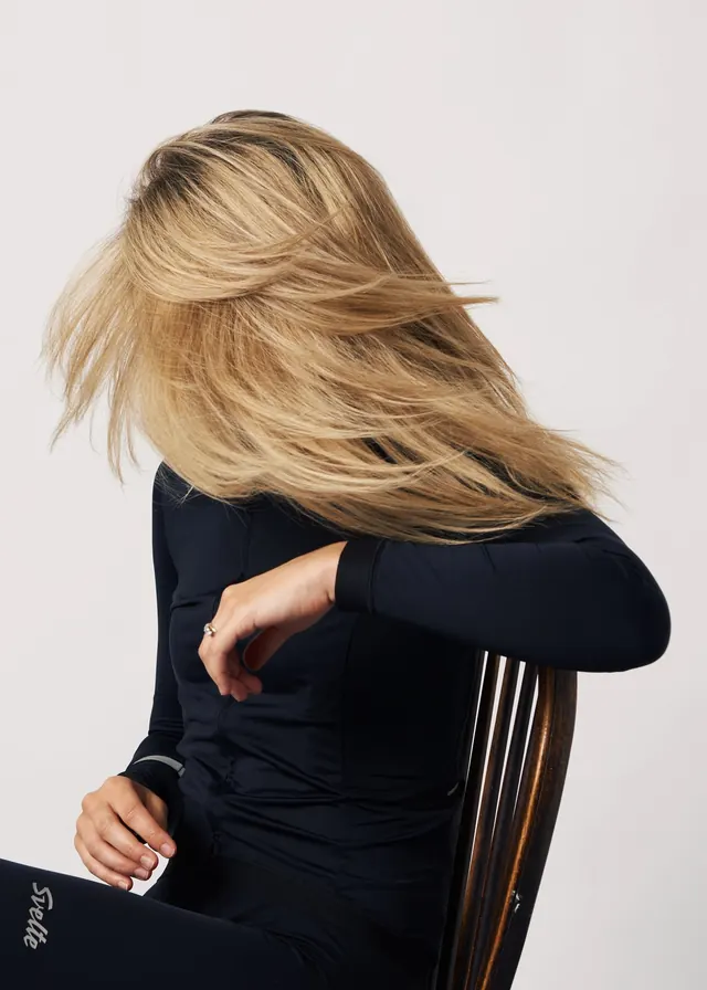 Portrait with motion-blurred hair, photographic, minimal, light