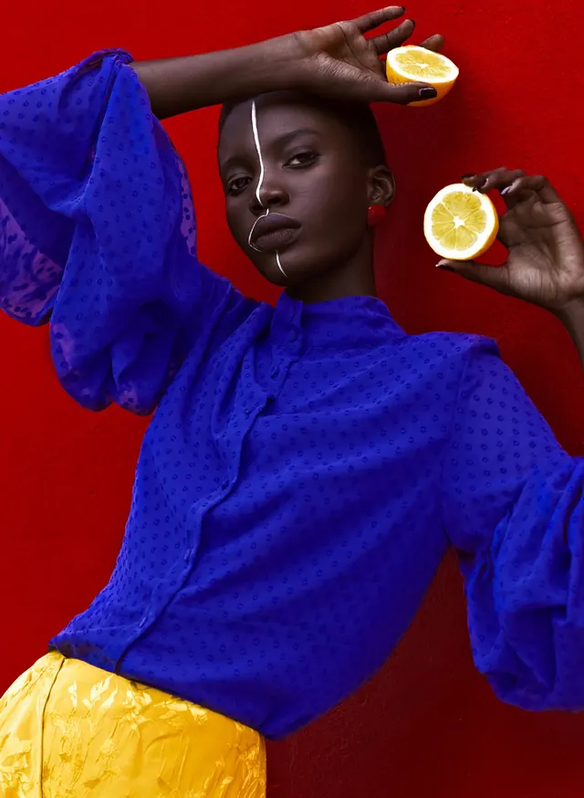 High-contrast editorial portrait with vibrant colors, editorial, photographic, vibrant