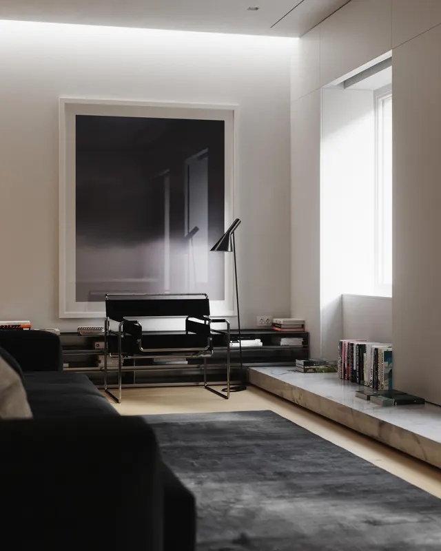 Minimalist monochrome living room with framed dark glass, minimal, corporate-clean, dark