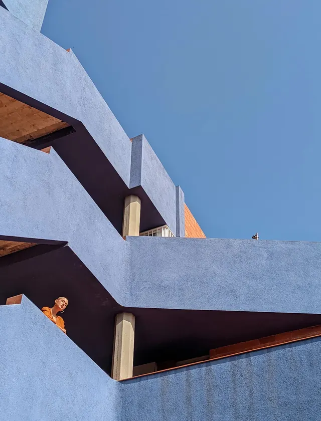 Brutalist stepped architecture with terraced overhangs, brutalist, minimalist, light