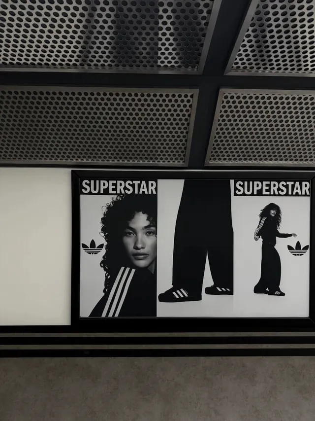 Adidas Superstar billboard advertisement, dark-mode, minimal, dark