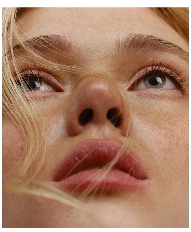 Close-up beauty portrait, photographic, warm