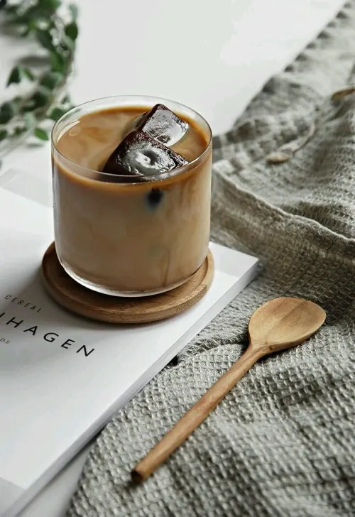Coffee drink with wooden spoon flat lay, photographic, organic, warm