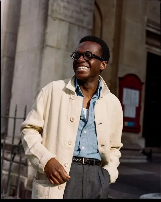 Vintage menswear portrait in urban setting, photographic, warm, warm