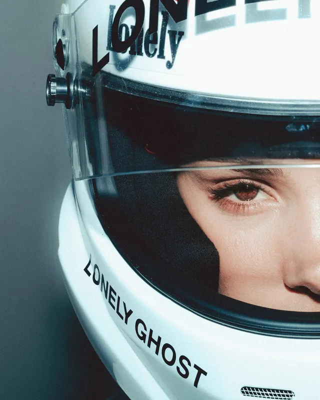 Helmet with "Lonely Ghost" text detail, photographic, technical, light