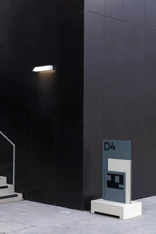 Minimalist architectural wayfinding sign, minimal, technical, dark