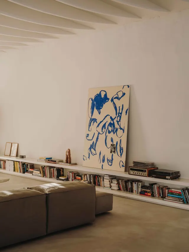 Minimalist gallery interior with abstract painting, minimal, brutalist, warm