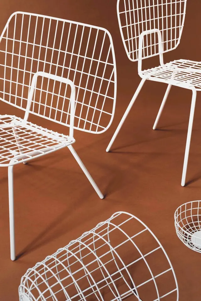 White wire-frame chair studio composition, minimalist, geometric, warm