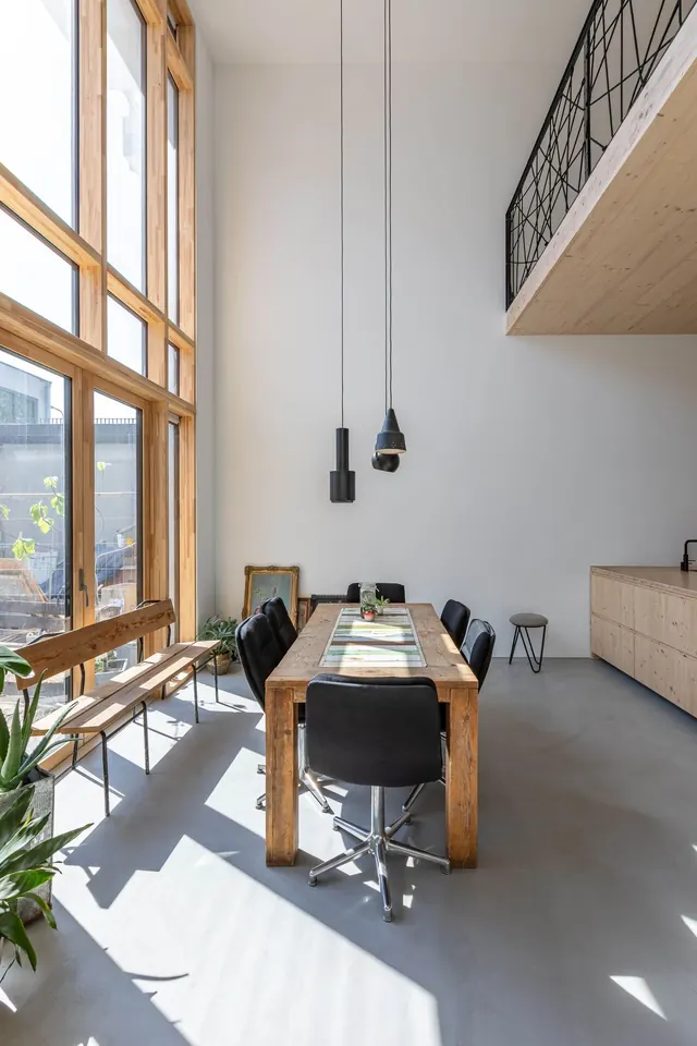 Minimalist loft workspace with natural light, minimal, corporate-clean, light