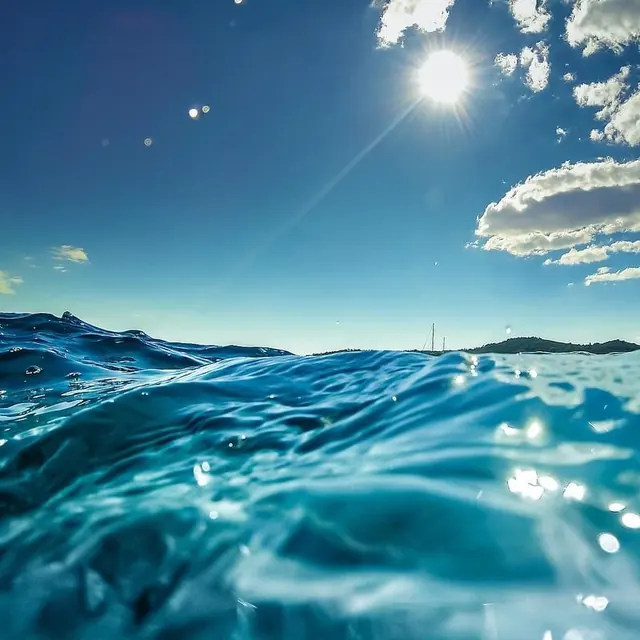 Water-level seascape with sailboat, photographic, minimalist, cool