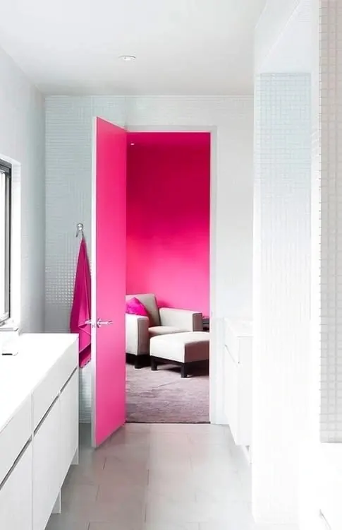 Interior with hot-pink accent wall, minimal, corporate-clean, vibrant