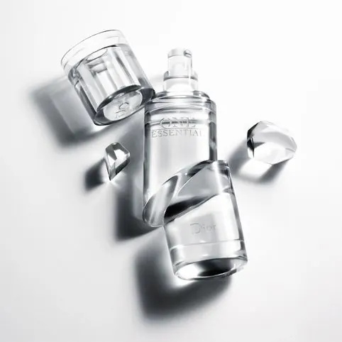 Minimalist fragrance bottle composition, minimal, photographic, light