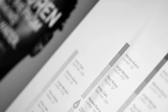 Angled book spine type specimen, photographic, editorial, monochrome