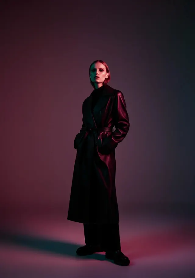 Fashion portrait with moody gradient lighting, photographic, gradient-heavy, gradient