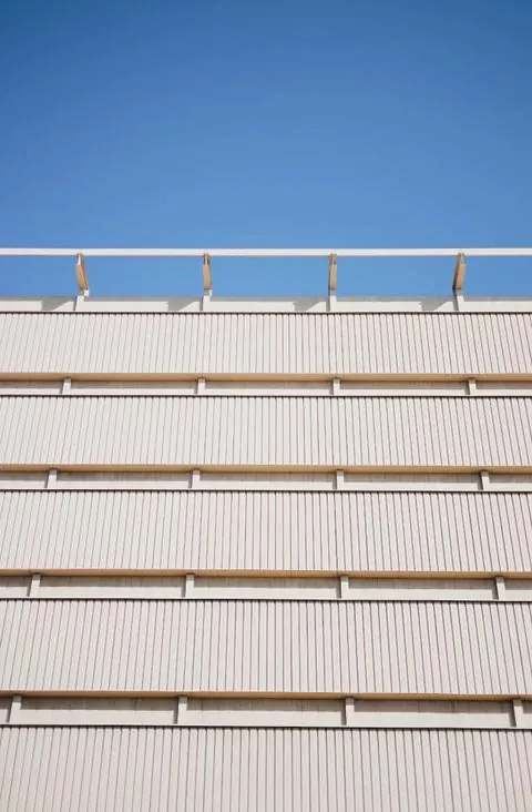 Minimalist striped building facade detail, minimal, geometric, light