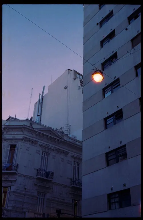 Urban twilight with classical and modern architecture, photographic, minimal, cool