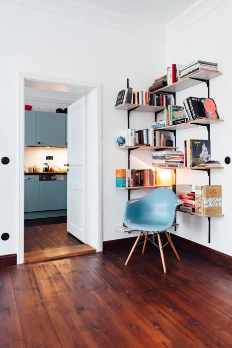 Modern office workspace with open shelving, photographic, minimal, light