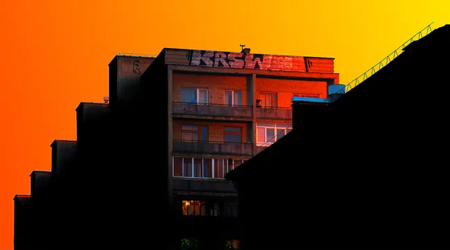 Neon-lit urban architecture photograph, photographic, dark-mode, dark