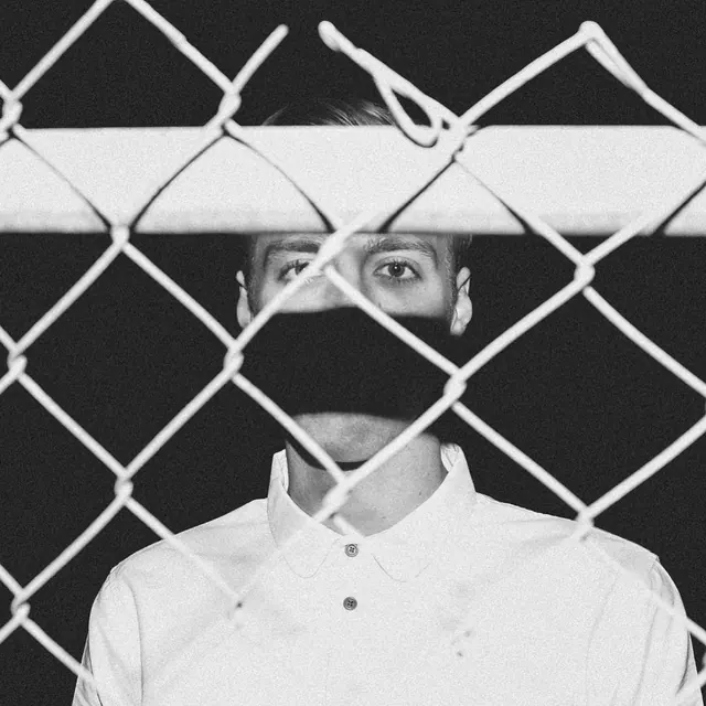Portrait Behind Chain-Link Fence, photographic, minimal, monochrome