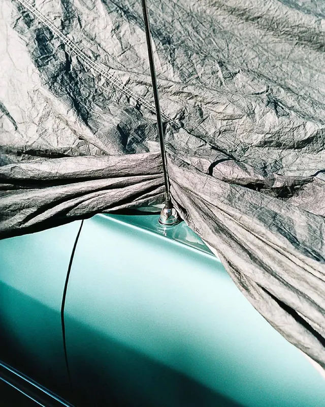 Teal Surface and Metallic Fabric