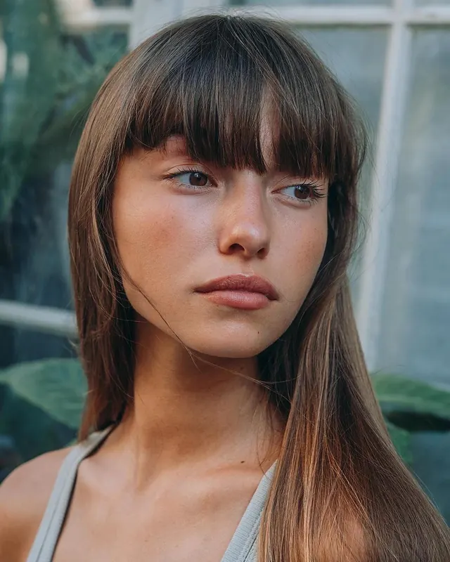 Portrait of a woman with bangs
