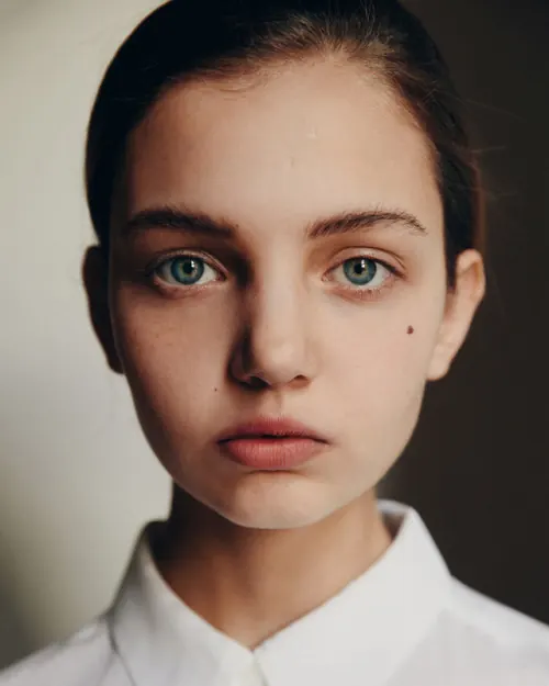 Portrait of a young woman in white