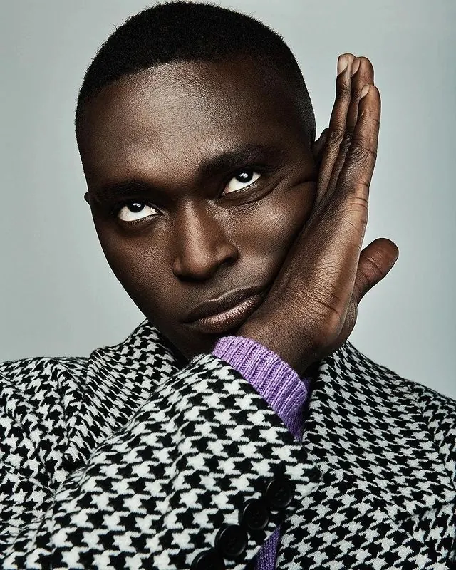 Portrait of a man in a houndstooth blazer