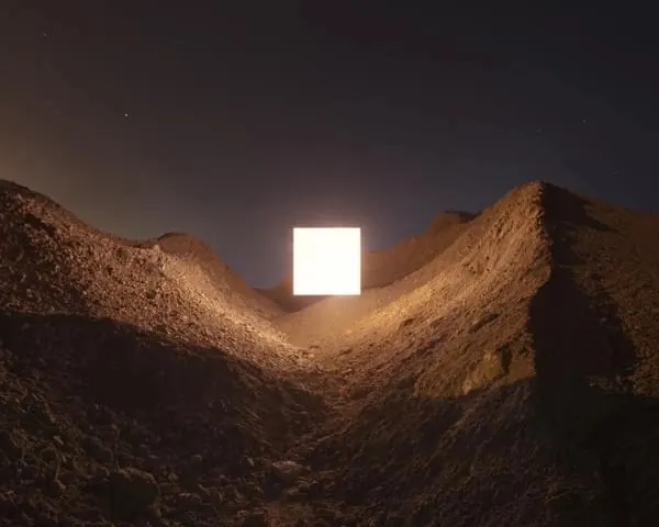 Glowing Cube in Desert Landscape