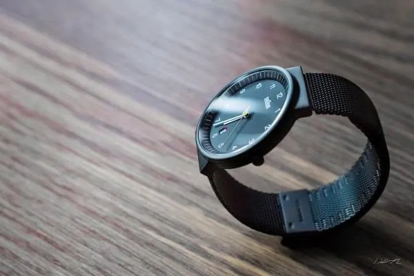 Analog Watch on Wood Surface