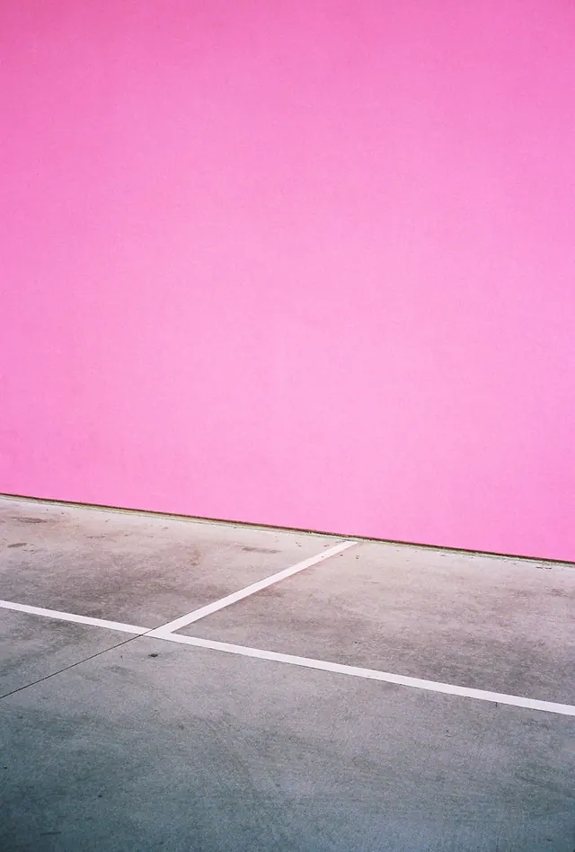 Pink Wall and Court Surface