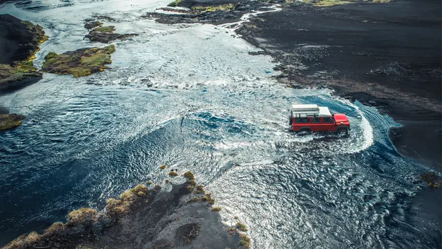 Aerial View of Boat in Choppy Water