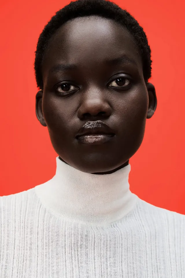 Portrait of a Woman in White Turtleneck
