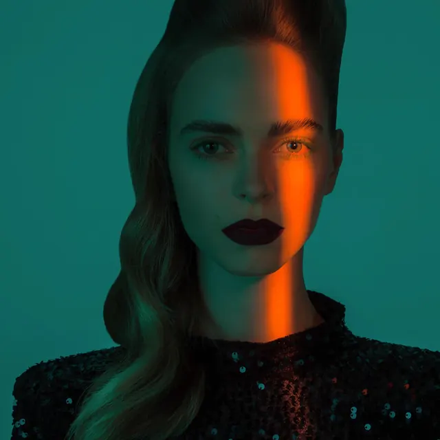 Split-tone portrait with teal and orange lighting, photographic, technical, cool