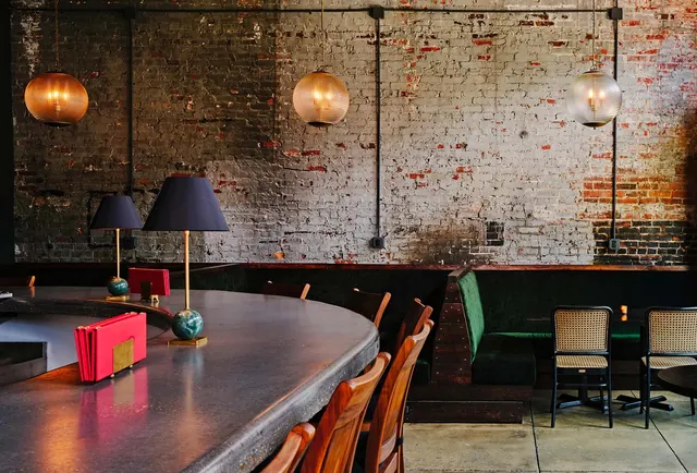 Modern industrial loft interior with exposed brick, photographic, technical, warm