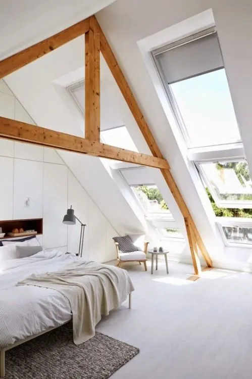 Attic bedroom with exposed timber beams, minimal, light-mode, light