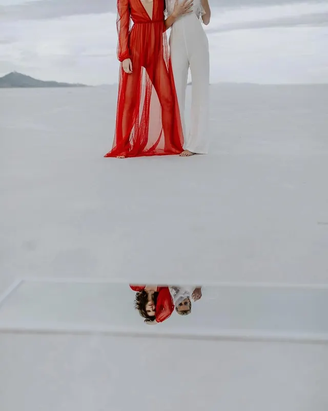 Two-figure fashion editorial with contrasting silhouettes, photographic, editorial, light